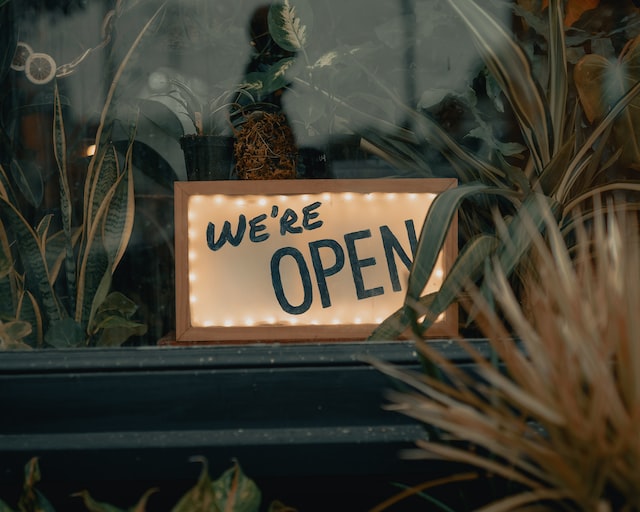 A “we’re open” window sign
