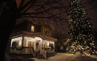 The outside of a house staged in the holiday spirit.