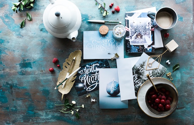A table full of holiday greeting cards.